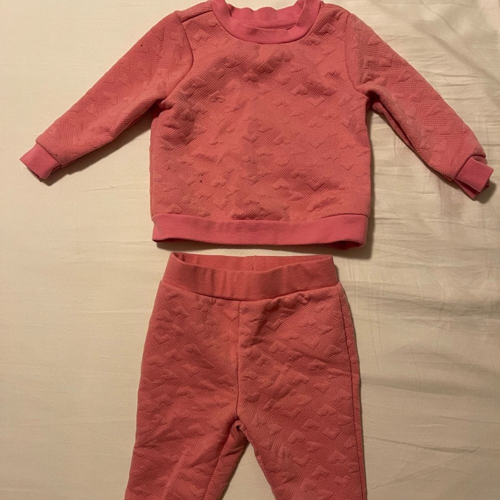 Two piece crew neck sweatshirt with matching sweat pants